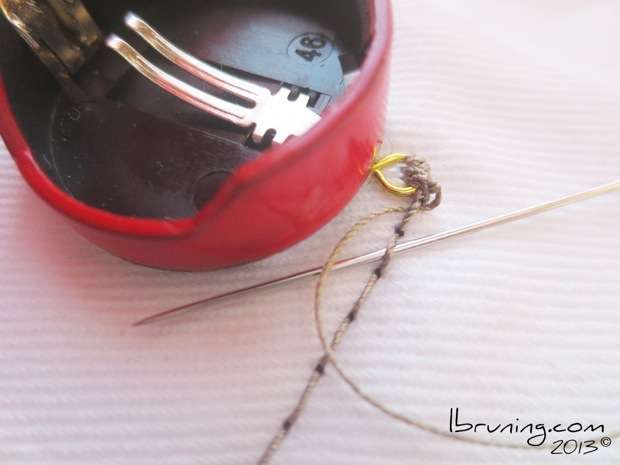 Sewing with Conductive Thread - backstitch to hold the thread tails